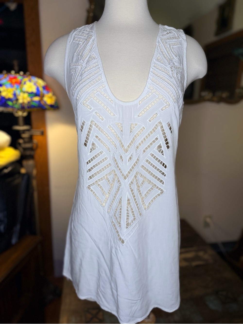White Sleeveless Cutout Tunic with Geometric Eyelet